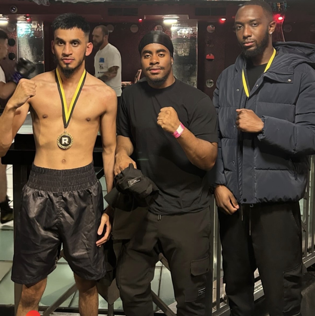 Coach Leonardo with fighters after a show
